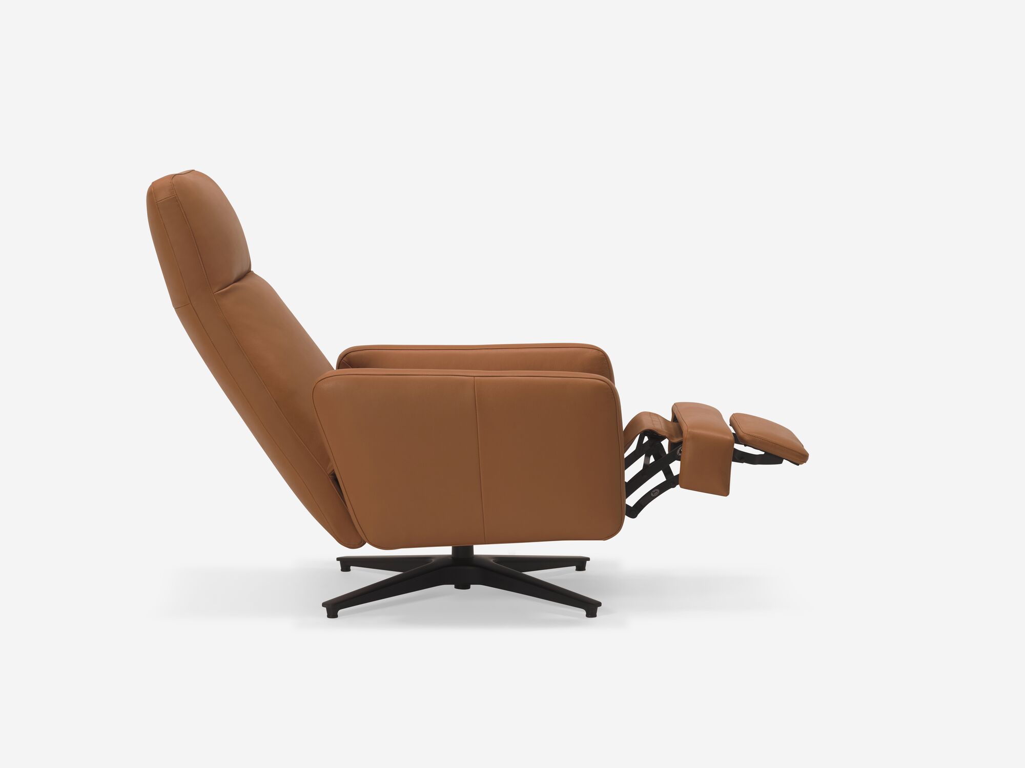 Side view of brown leather reclining chair with foot rest reclined